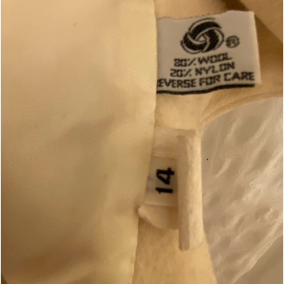 Rock your vintage lifestyle with this Herman Kay white wool coat.Size 14. - Picture 6 of 14